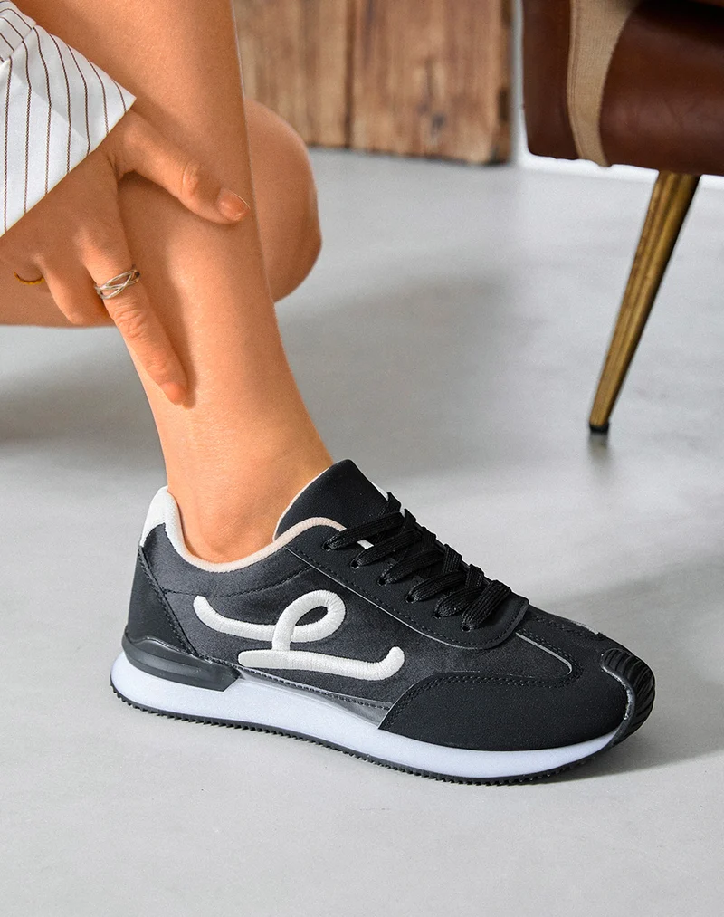 Basket femme noire tendance avec lettre "L" blanche tissée