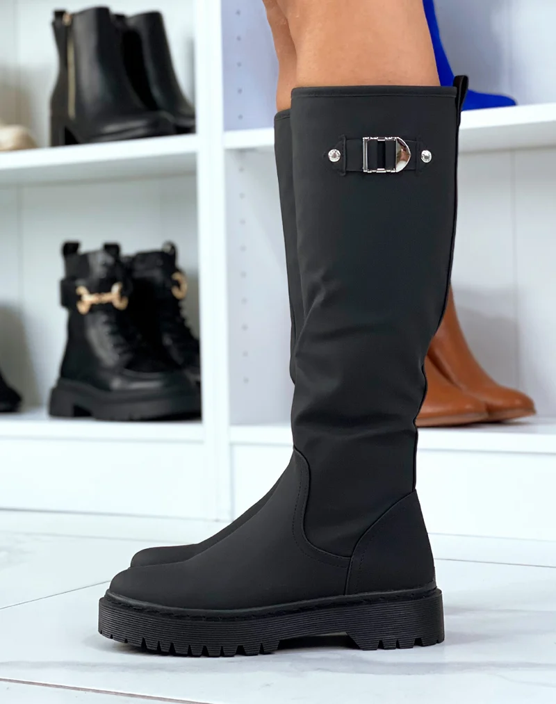 Bottes montantes noirs à semelles plates à détails dorées