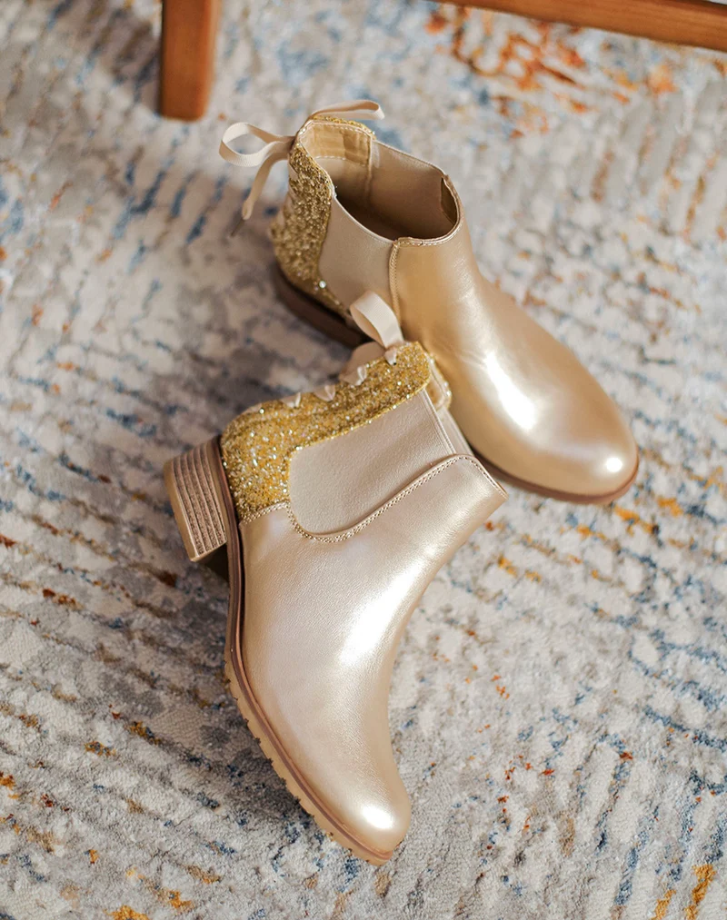 Chelsea boots basses dorées à paillettes et noeud