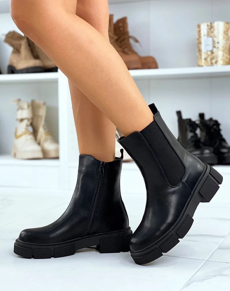 Chelsea boots noires montantes à semelle crantée
