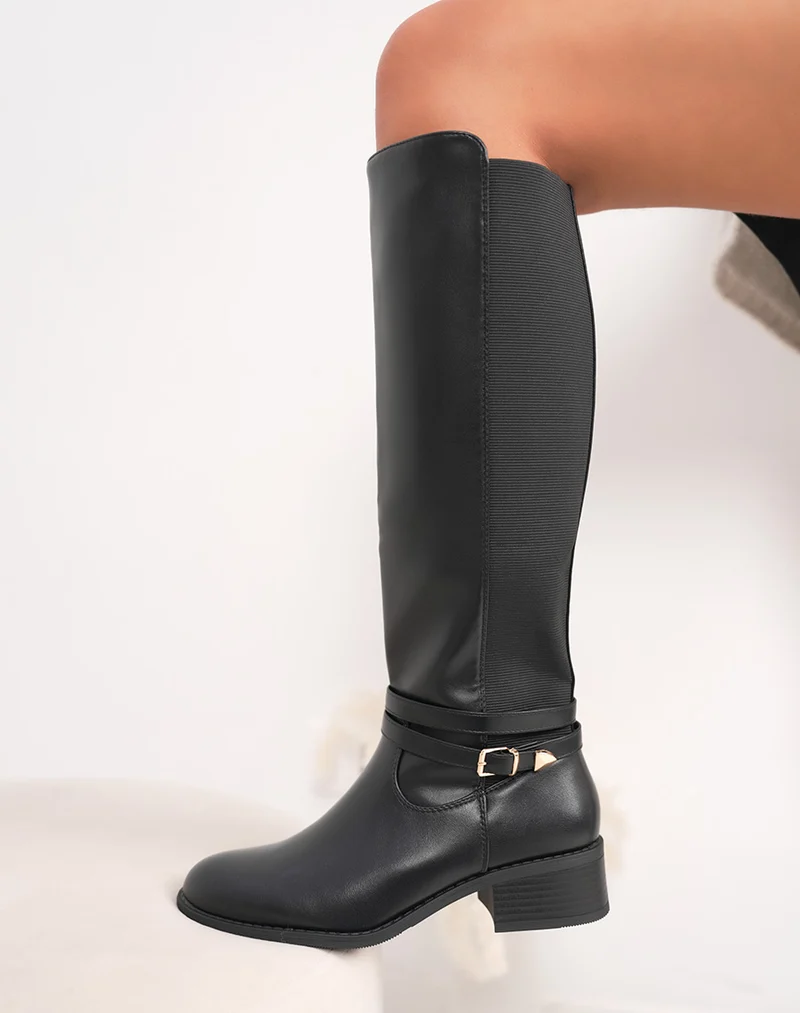 Bottes femme noires à petit talon avec lanière dorée et élastiques latéraux