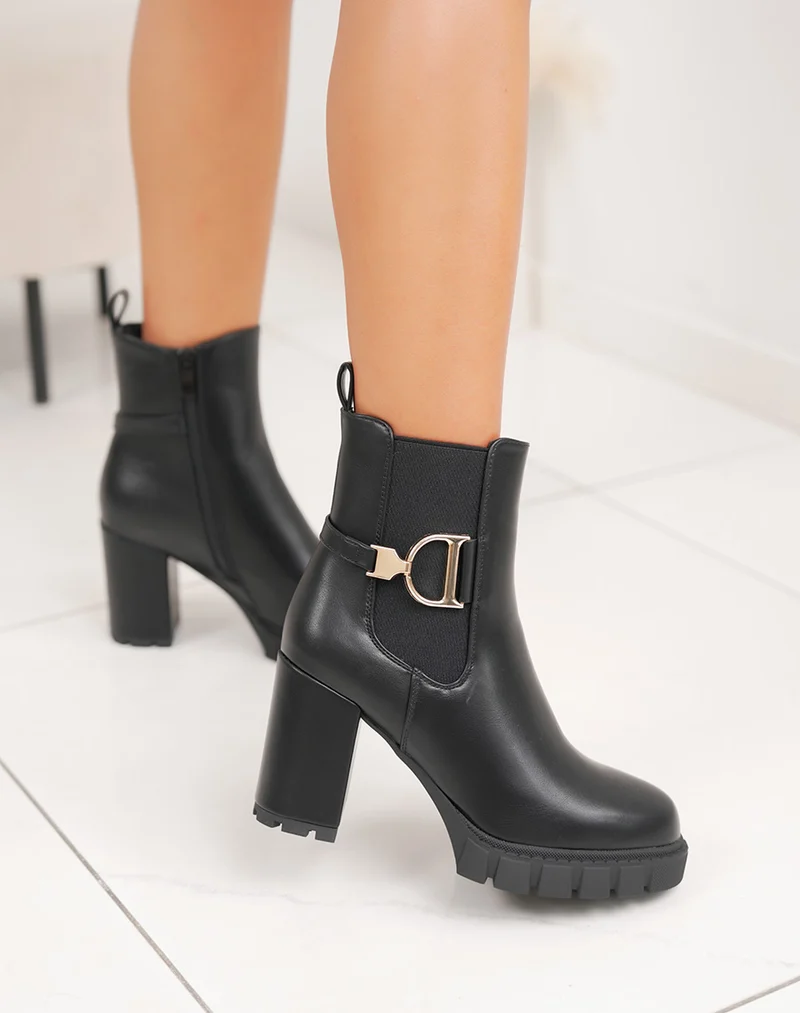 Bottines femme noires style Chelsea à talons hauts avec détail doré et semelle crantée