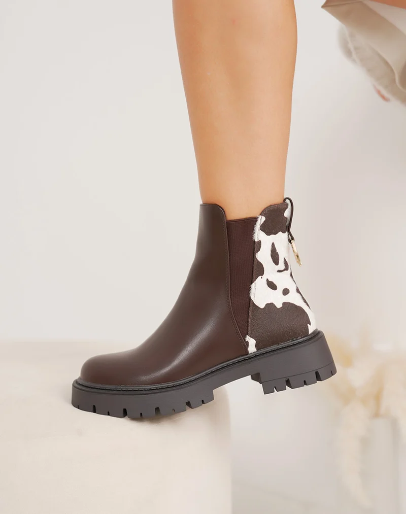 Bottines marron fourrées détails vachette