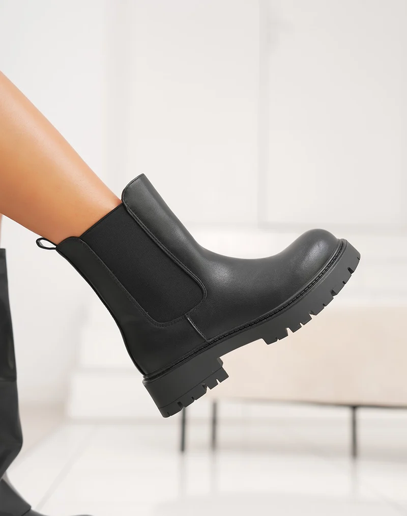 Bottes noires effet deux en un avec semelle crantée