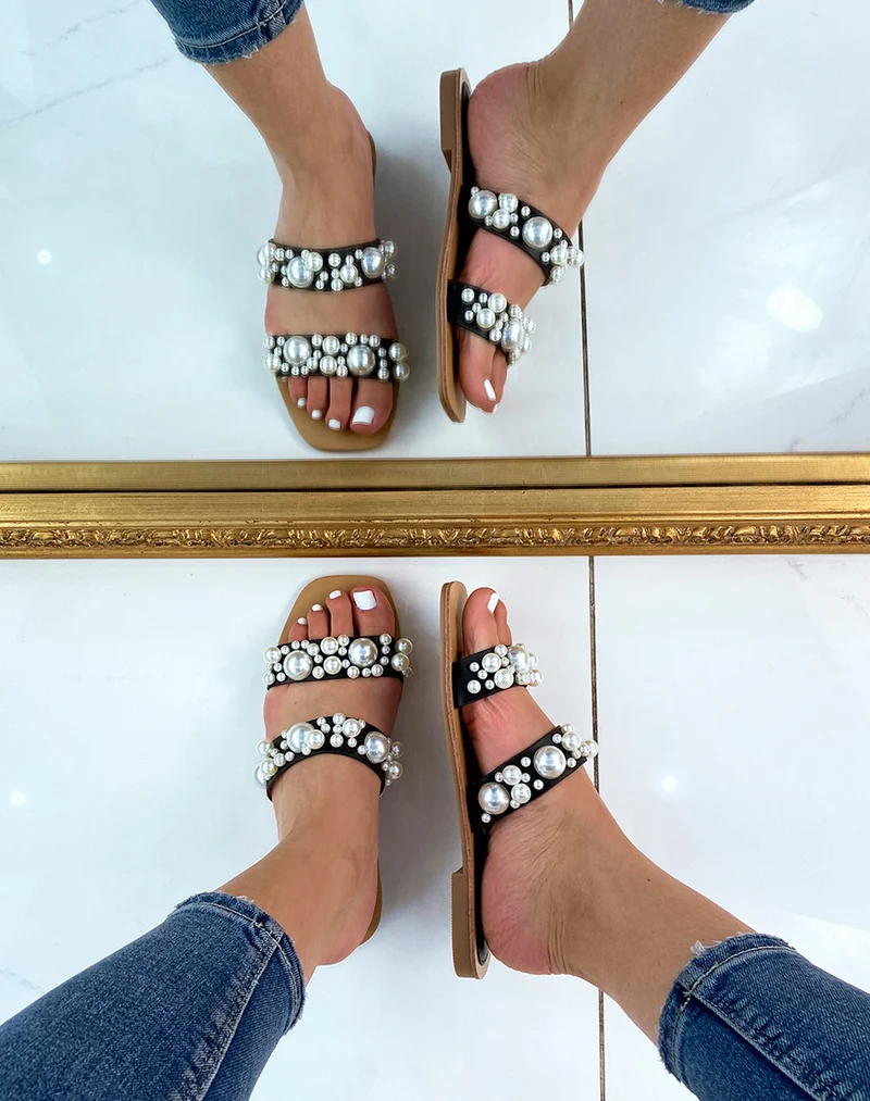 Mules plates noires à double brides