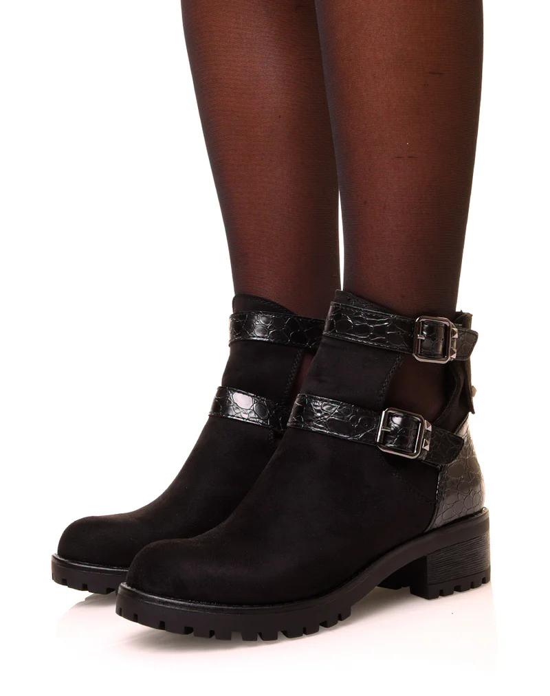 Bottines noires en suédine crantées à boucles
