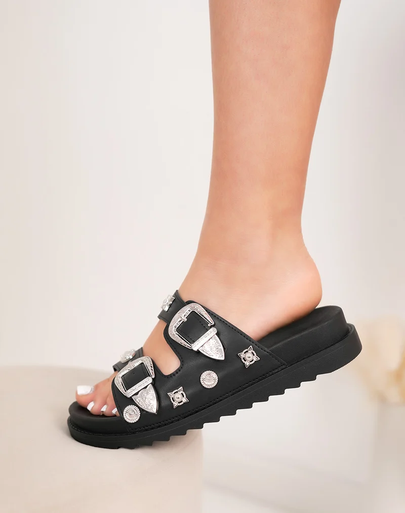 Mules plates femme noires tendance avec détails argentés ajustables