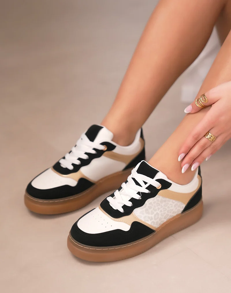 Baskets femme noires et blanches élégantes avec effet léopard argenté et détails dorés