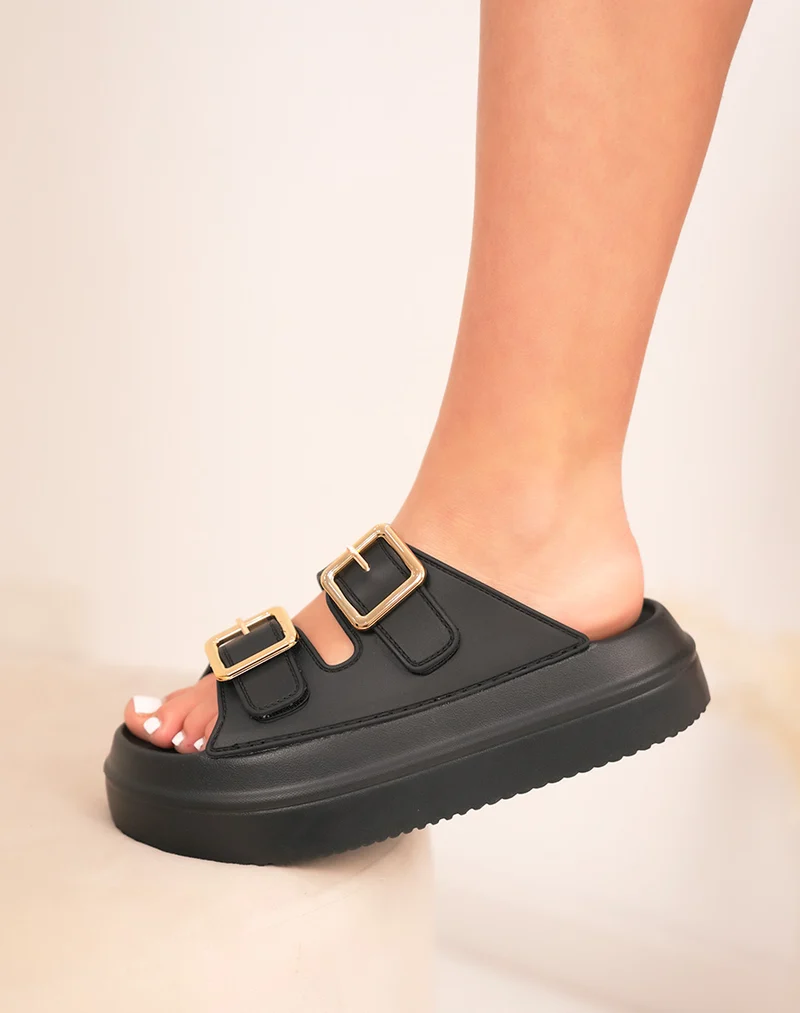 Mules femme noires effet mat tendance à boucles dorées et semelle épaisse