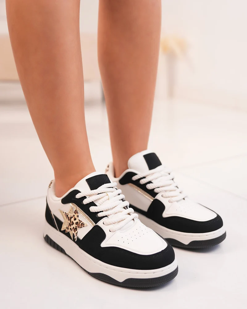 Basket femme blanche et noire tendance avec étoiles léopard et lacets épais