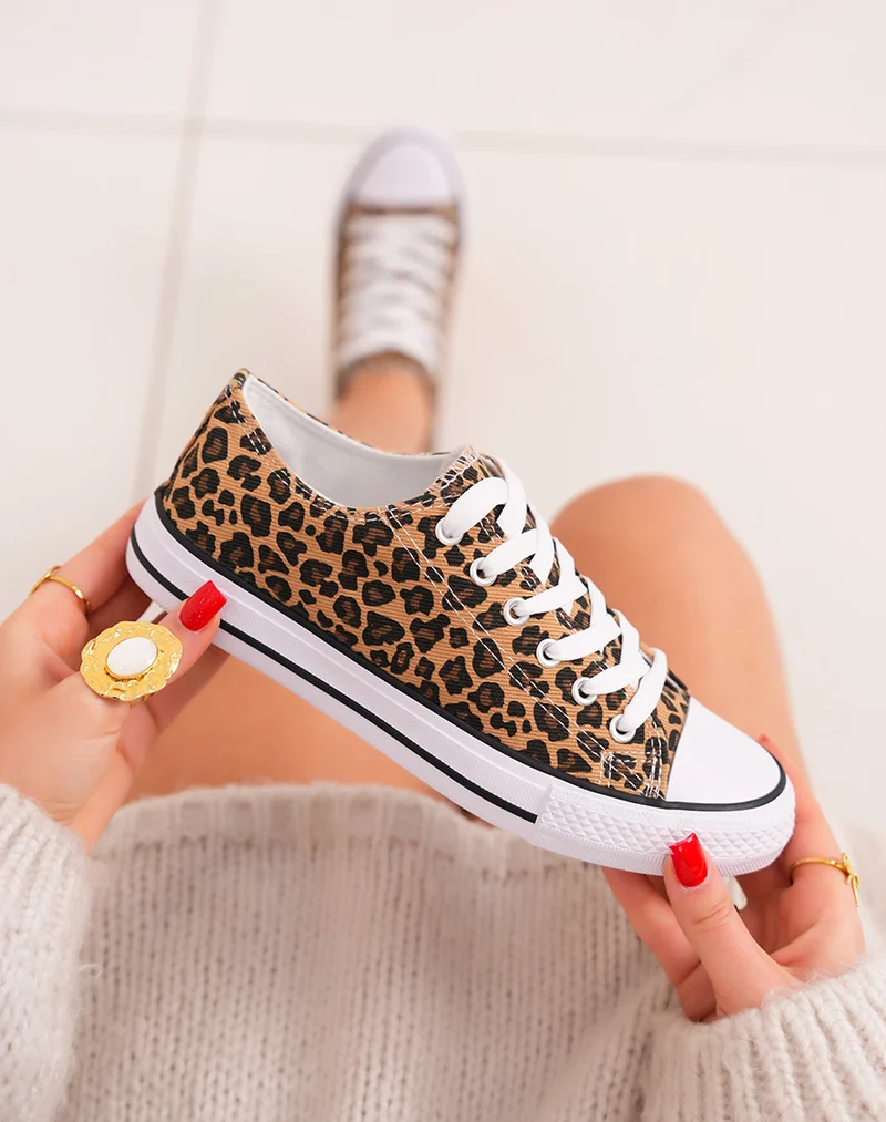 Baskets femme basses tendance à imprimé léopard et semelle blanche