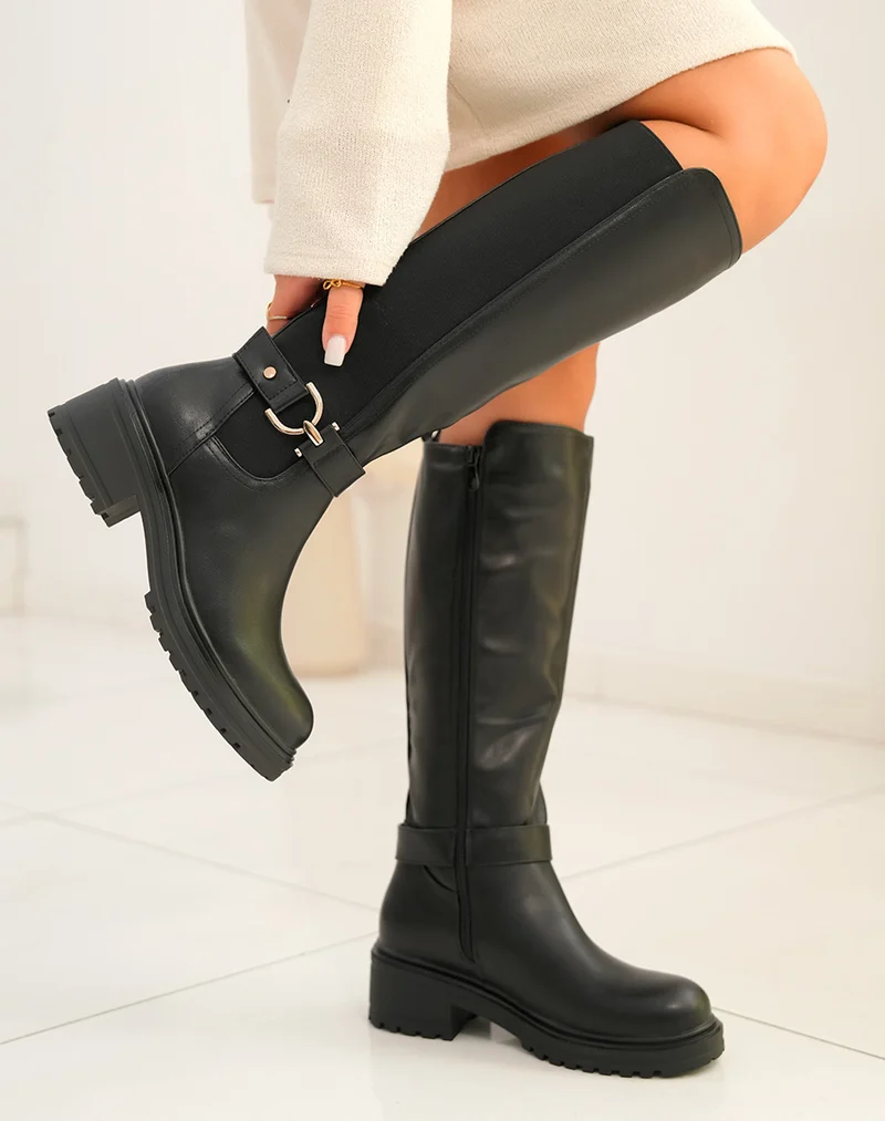 Bottes femme noires hautes avec lanière dorée et semelle crantée