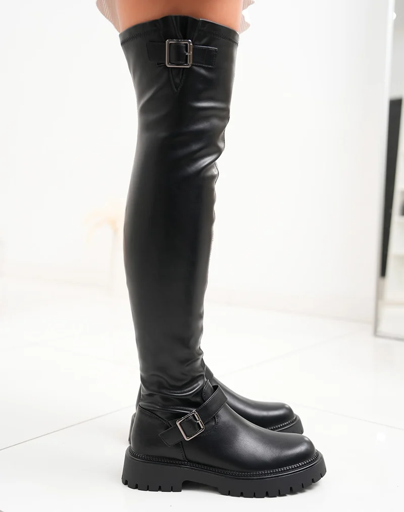 Cuissardes noires à tige souple et boucles élégantes
