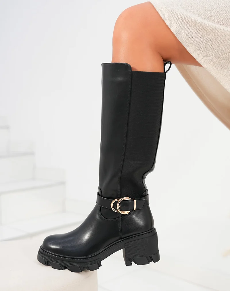Bottes femme noires avec élastique semelle crantée et double boucle dorée