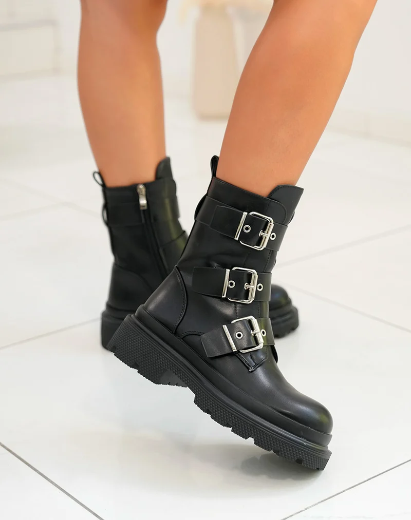 Bottines femme noires à sangles épaisses avec détails argentés semelle crantée