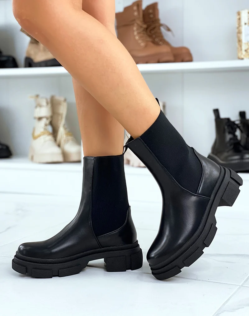 Bottines noires montantes à élastiques et semelle crantée