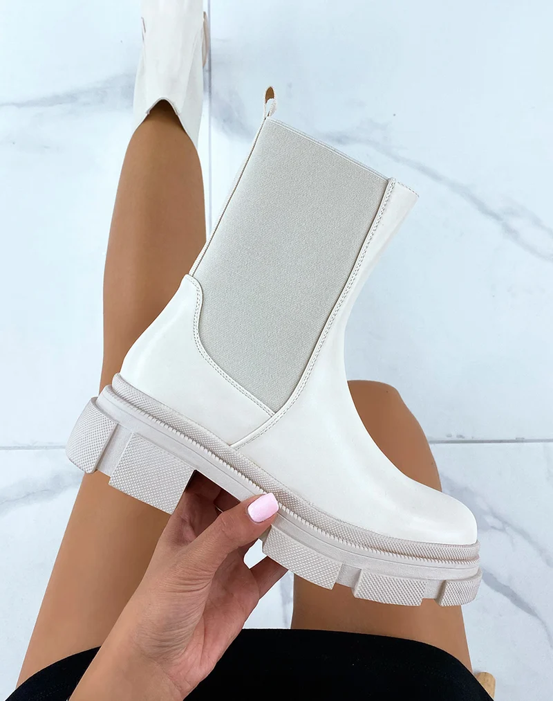 Bottines beiges montantes à élastiques et semelle crantée