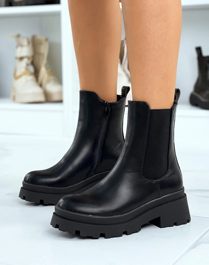 Chelsea boots noires montantes à talon et semelle crantée