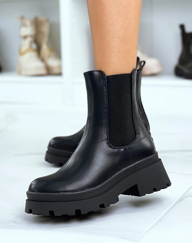 Chelsea boots noires montantes à talon et semelle crantée