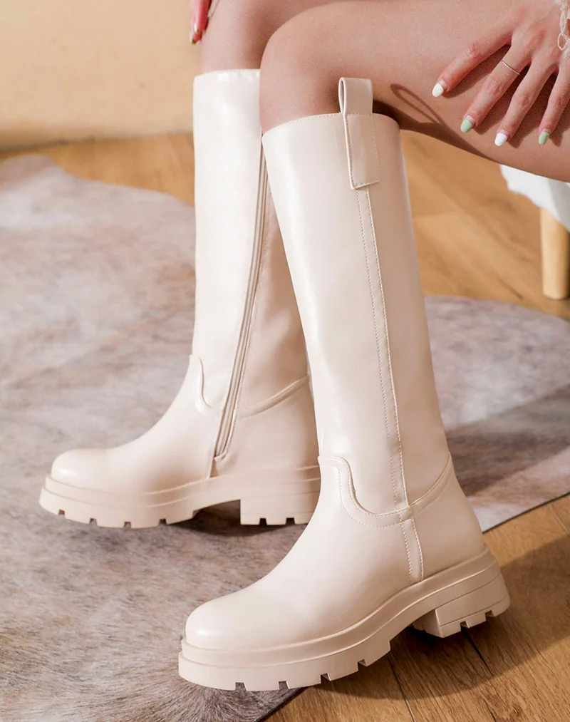 Bottes hautes beige à semelle crantée