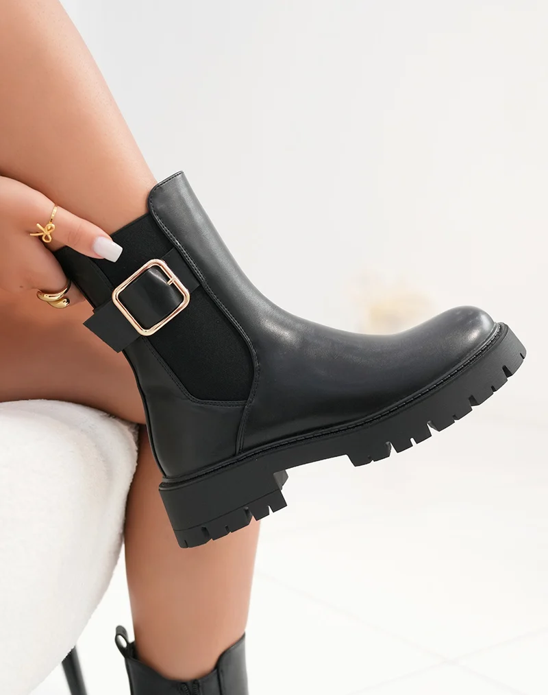 Bottines femme noires style Chelsea avec boucle dorée et semelle crantée