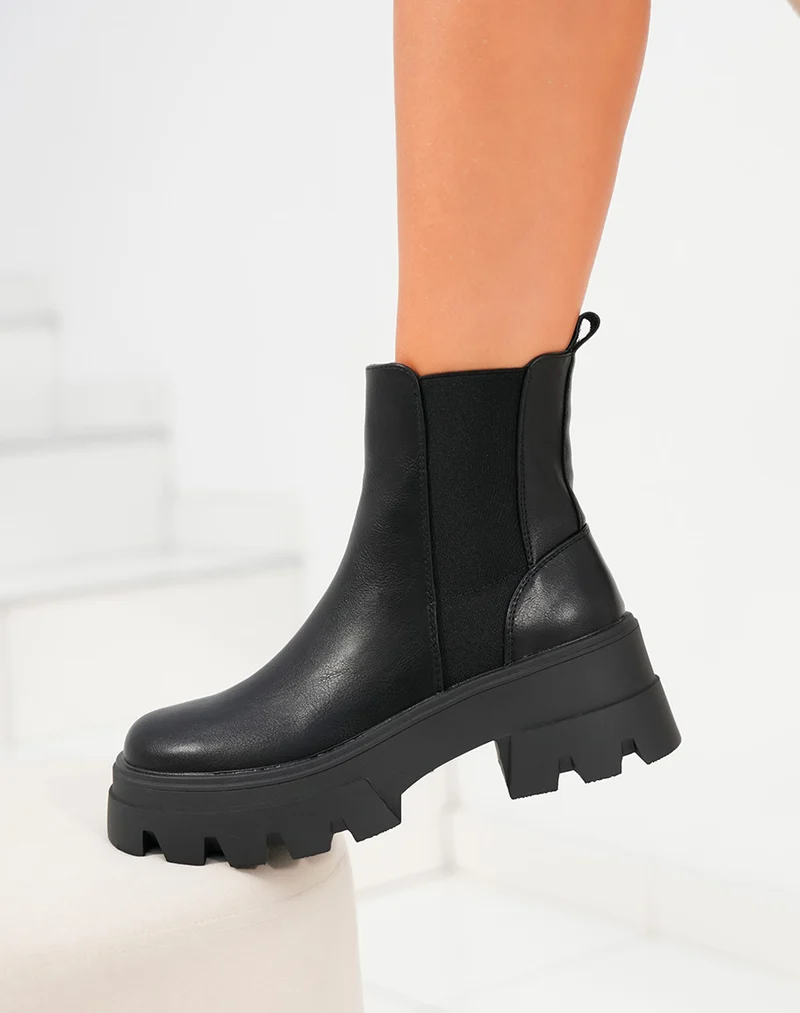 Bottines femme noires à élastique et semelle crantée épaisse