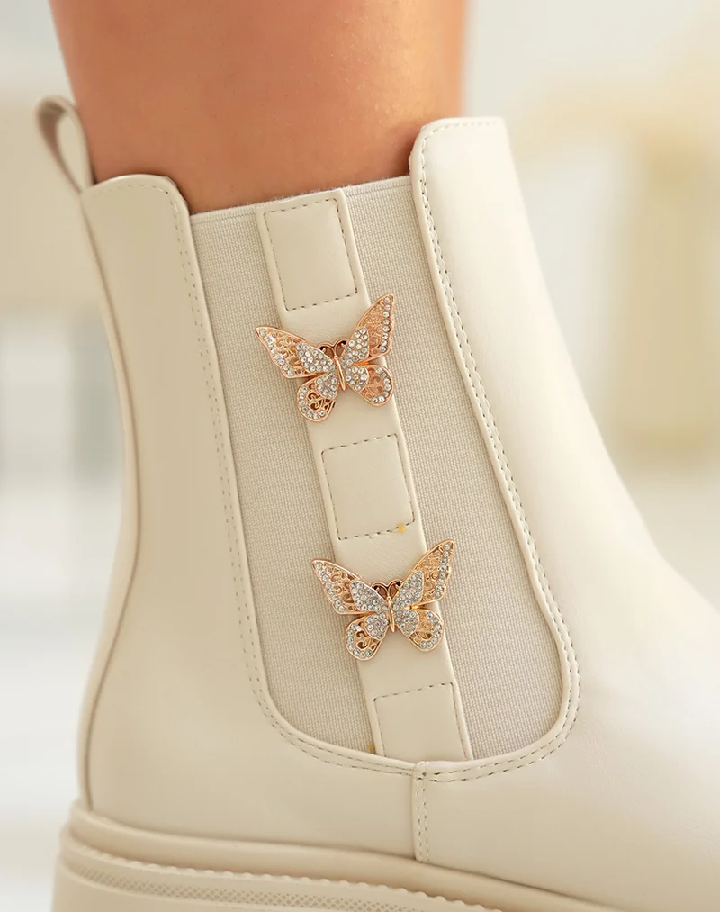 Bottines femme beige style Chelsea avec papillons dorés et semelle crantée