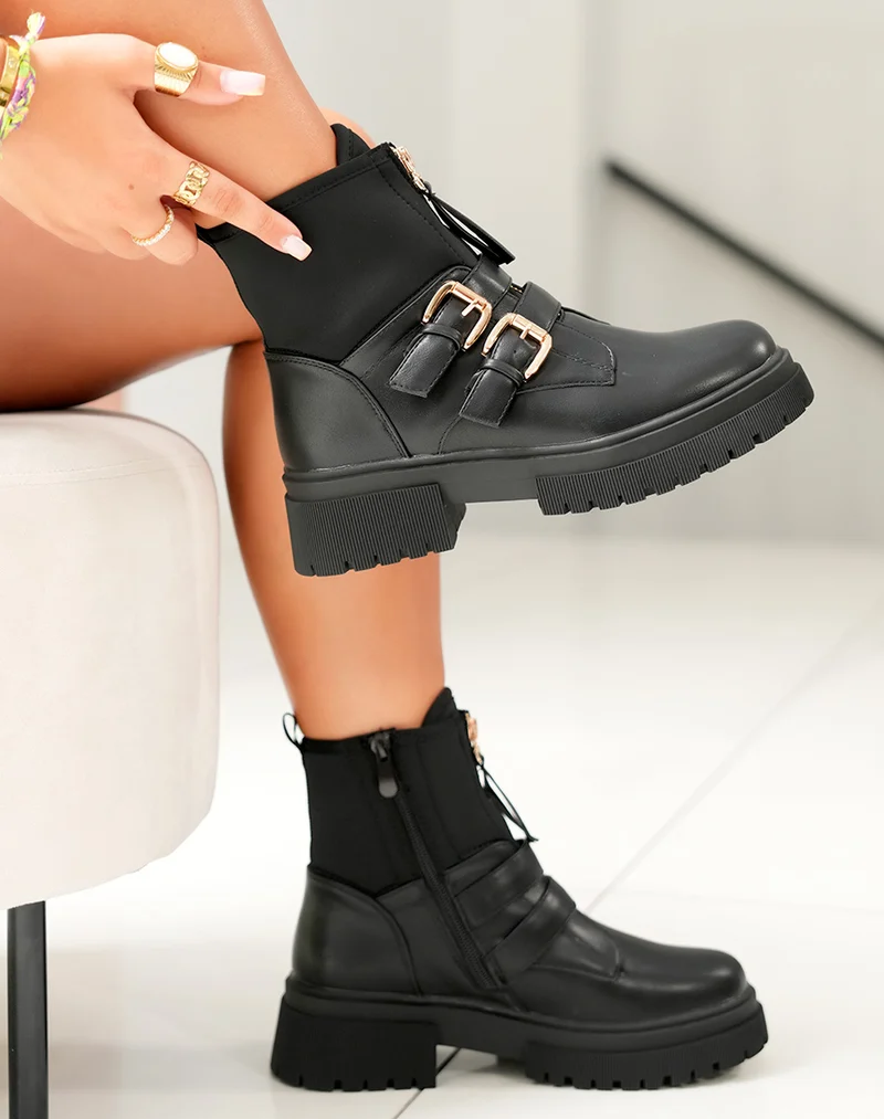 Bottines noires: Zippé et détails dorés