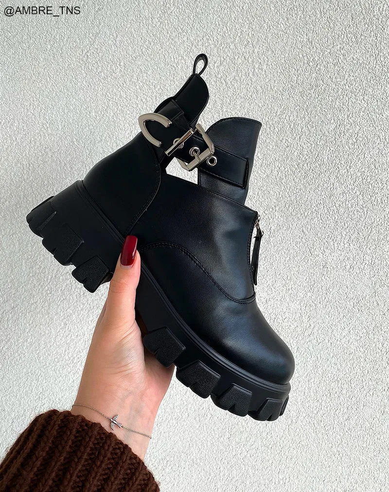 Bottines ouvertes noires zipées à lanières et semelles crantées