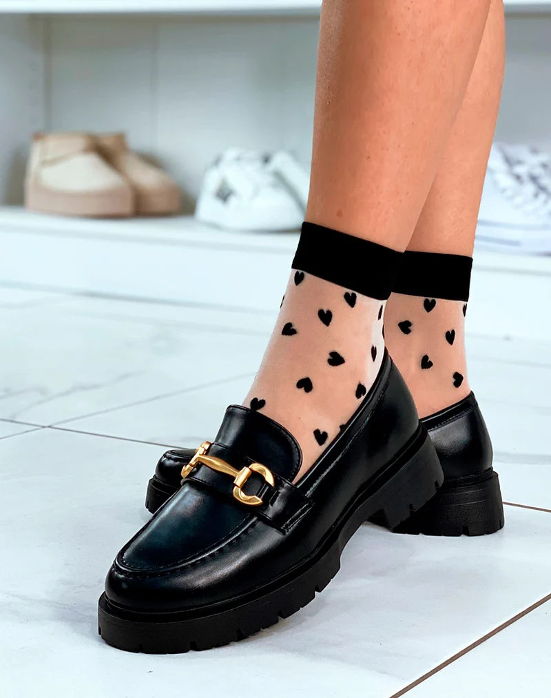 Mocassins noires à détail doré pour femme