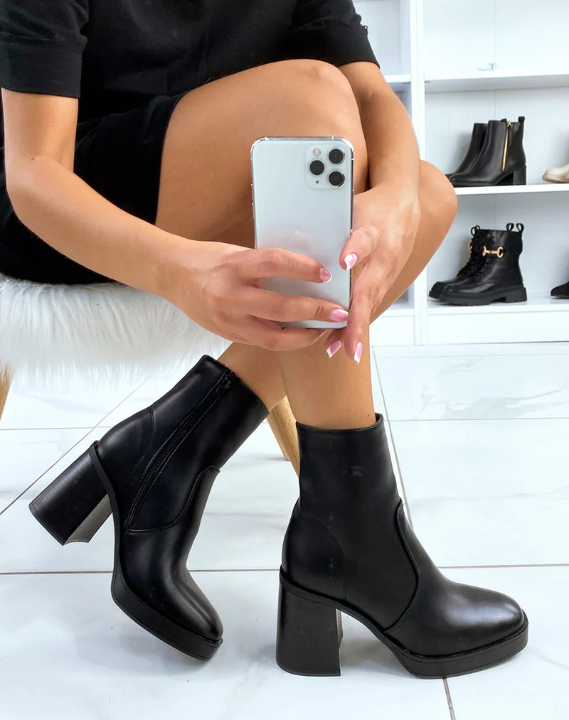 Bottines noires cintrées à talon épais