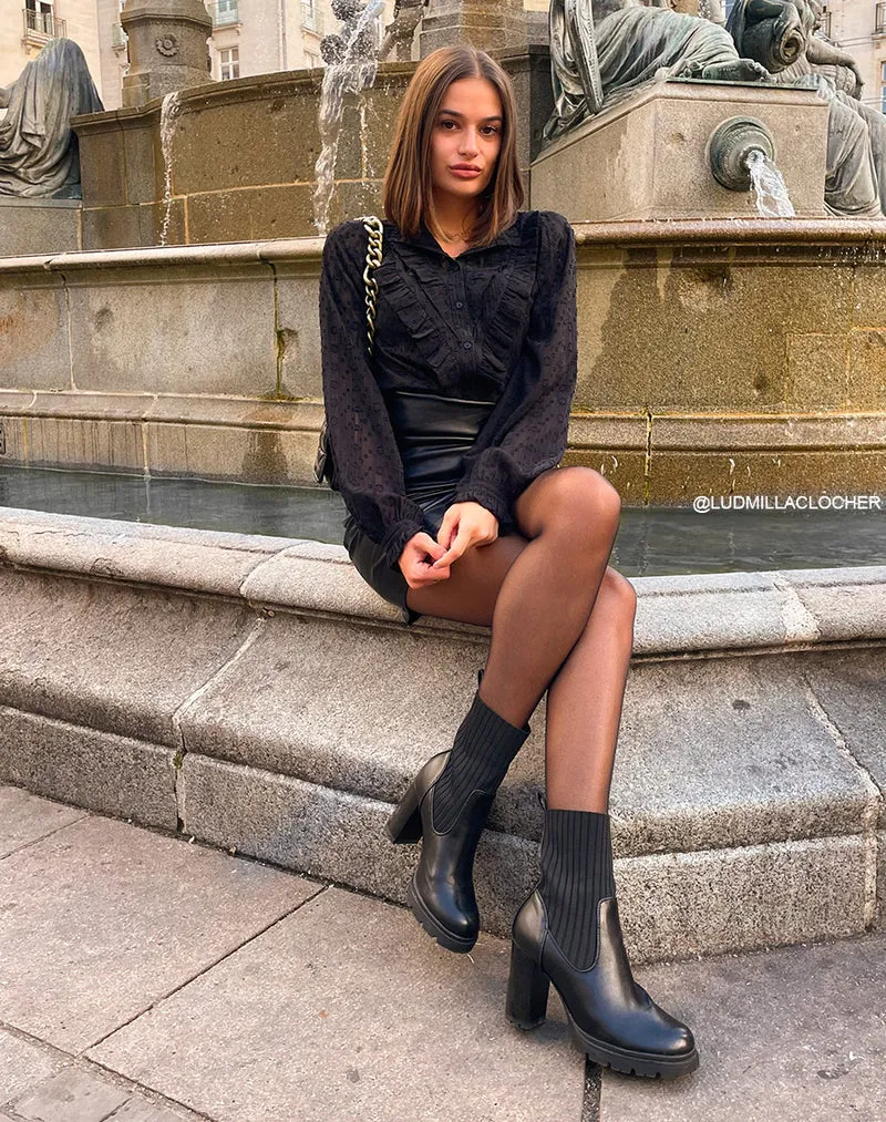 Bottines noires à talon et élastique