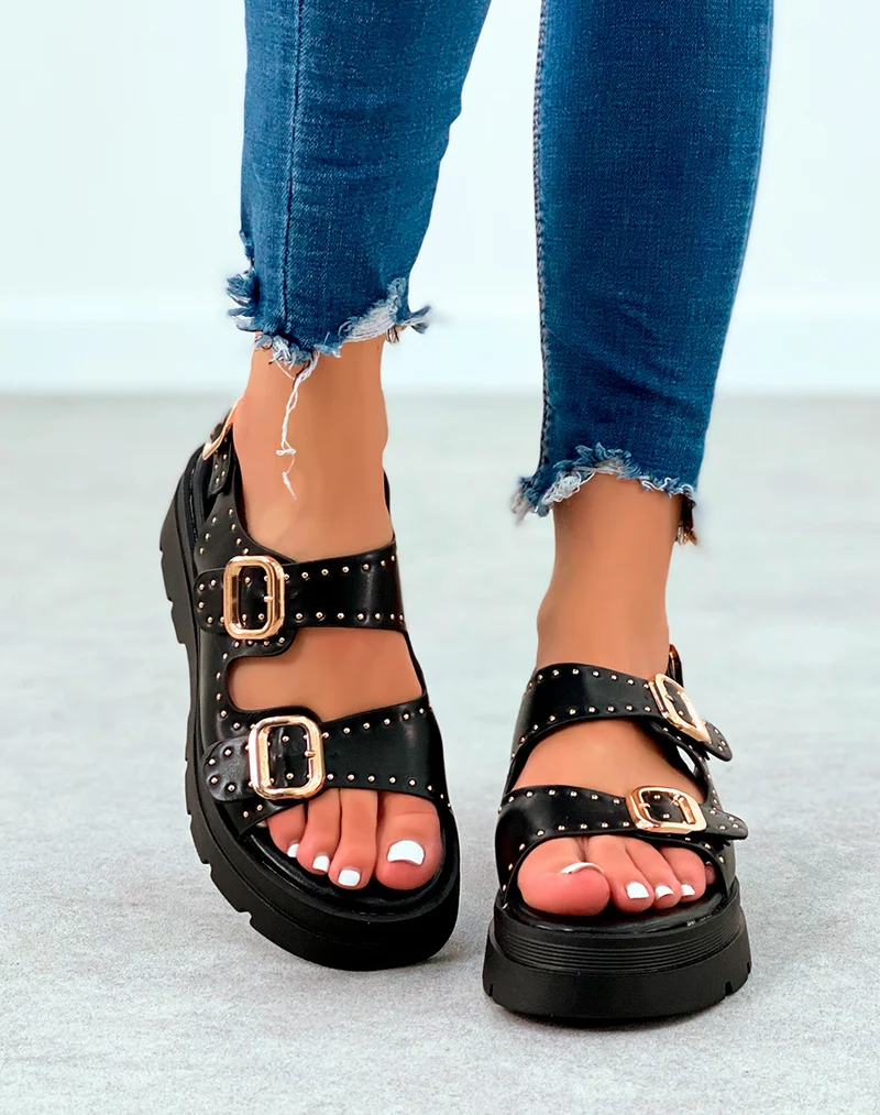 Sandales noires cloutées à multiples lanières et à la boucle réglable
