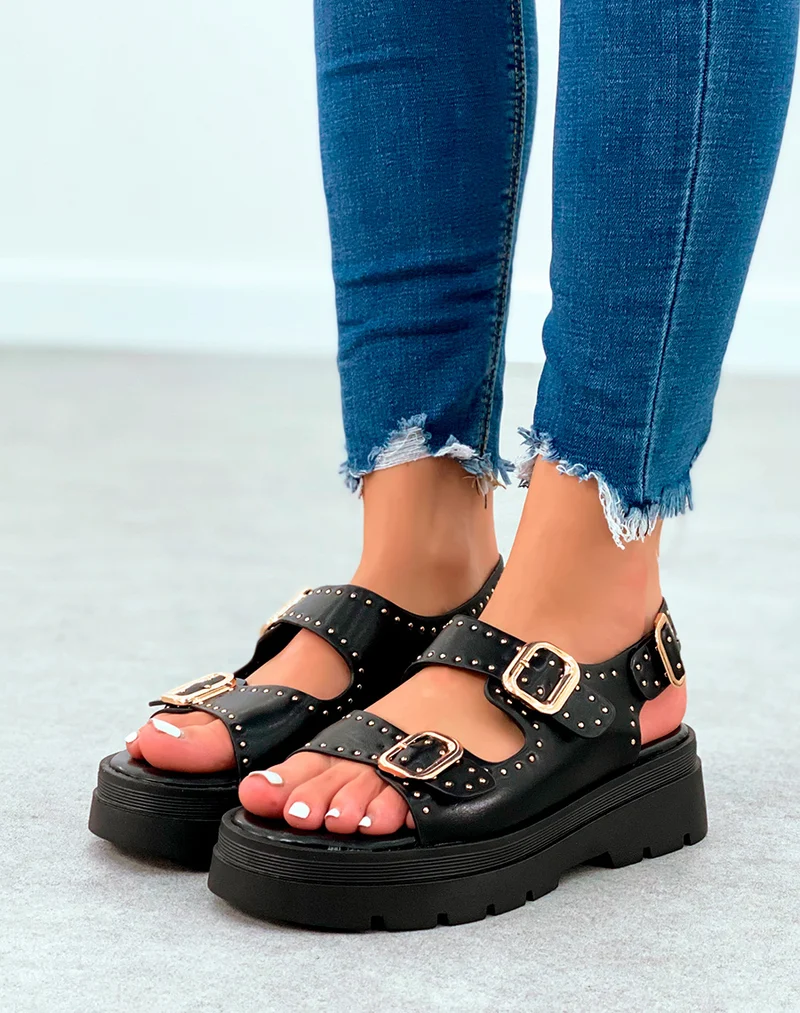 Sandales noires cloutées à multiples lanières et à la boucle réglable