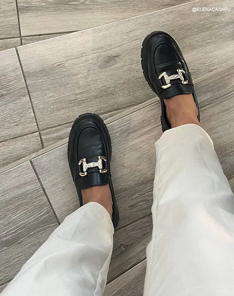 Mocassins noirs tendance pour femme avec détails dorés et strass