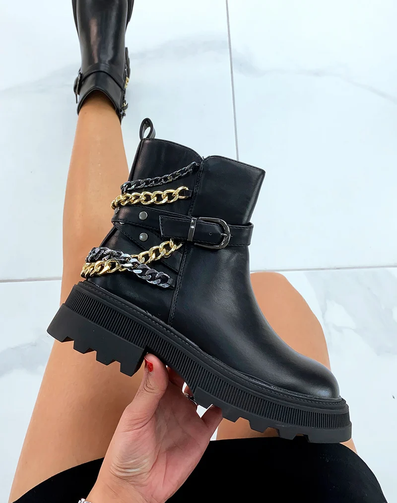 Bottines noires à lanière et à chaînes dorées et noires