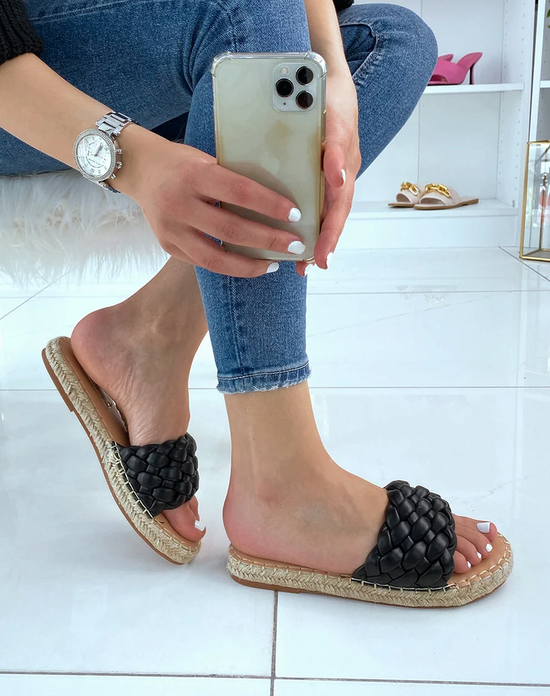 Mules noires tressées à semelle en jute