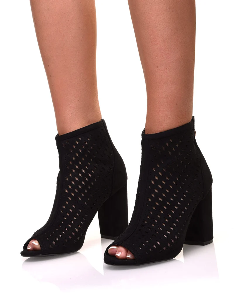Bottines noires ajourées à talon