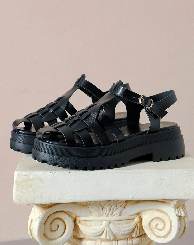 Sandales noires semi-fermées à multiples brides et semelle crantée