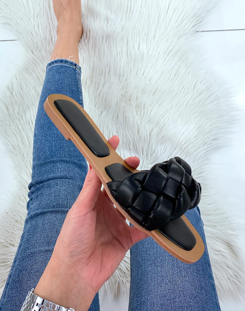 Mules plates noires à grosse bride tressée
