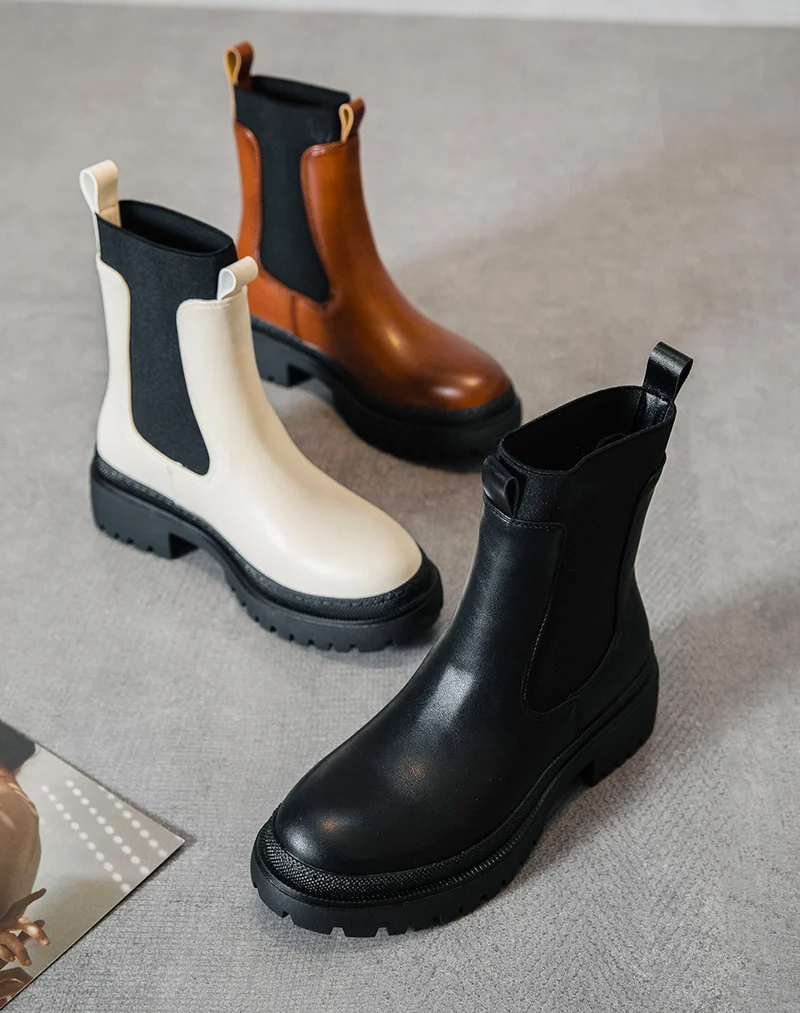 Bottines crème style chelsea à élastique montant