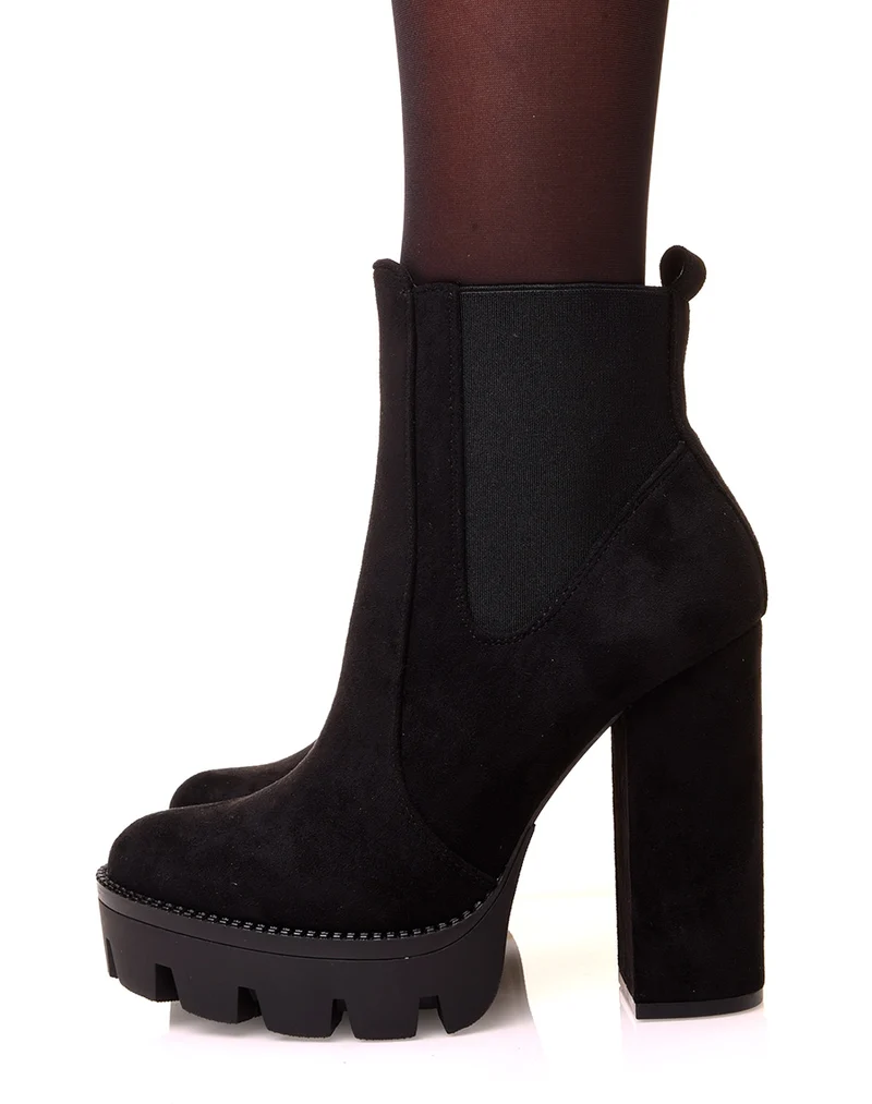 Bottines noires en suédine à talons et plateformes crantées