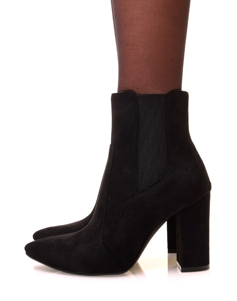 Bottines noires en suédine à talons et bouts pointus