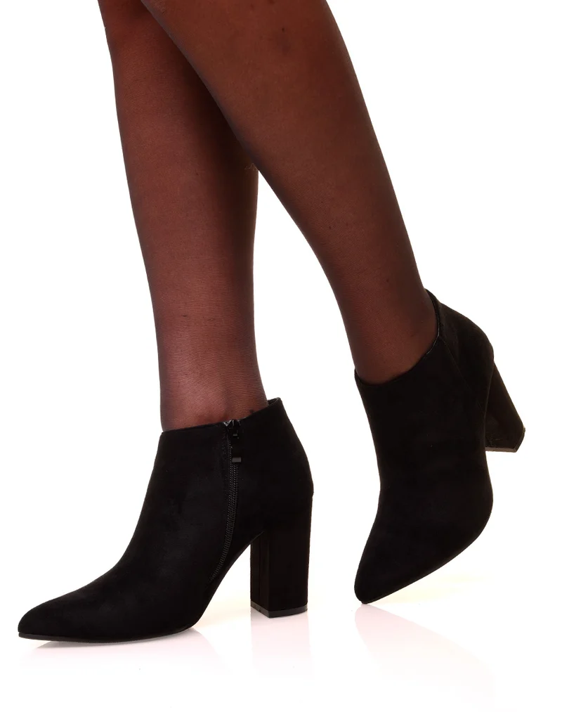 Bottines noires en suédine à talons et à bouts pointus
