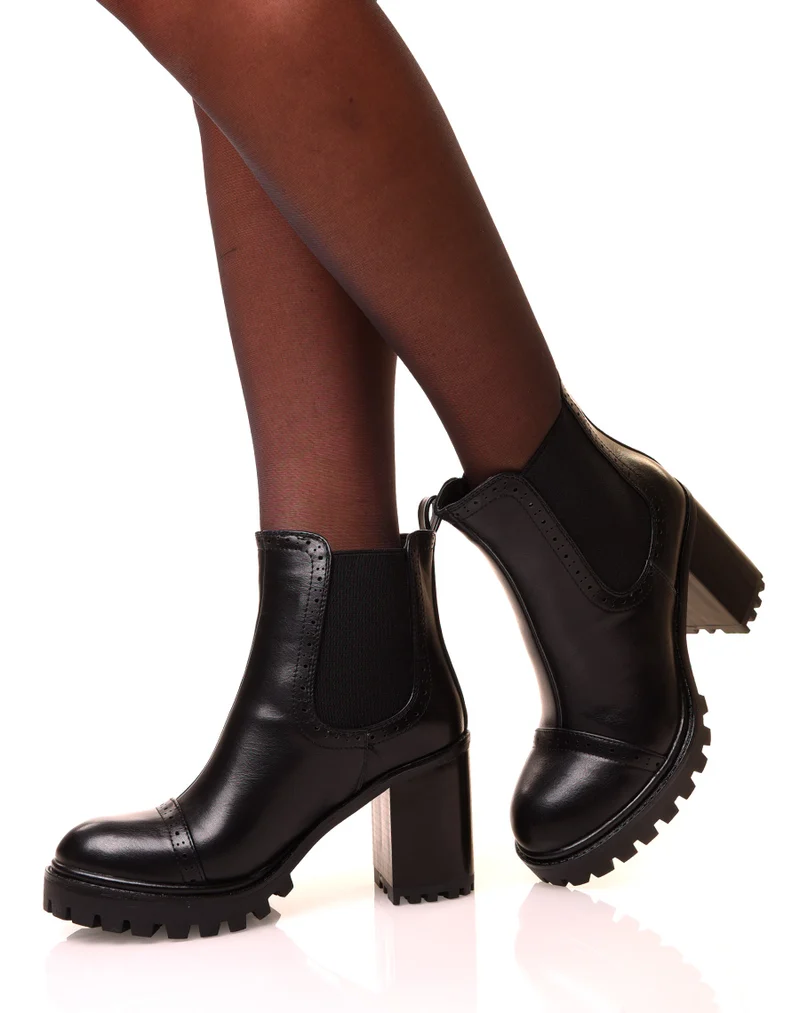 Bottines noires à talons carrés et à semelles crantées