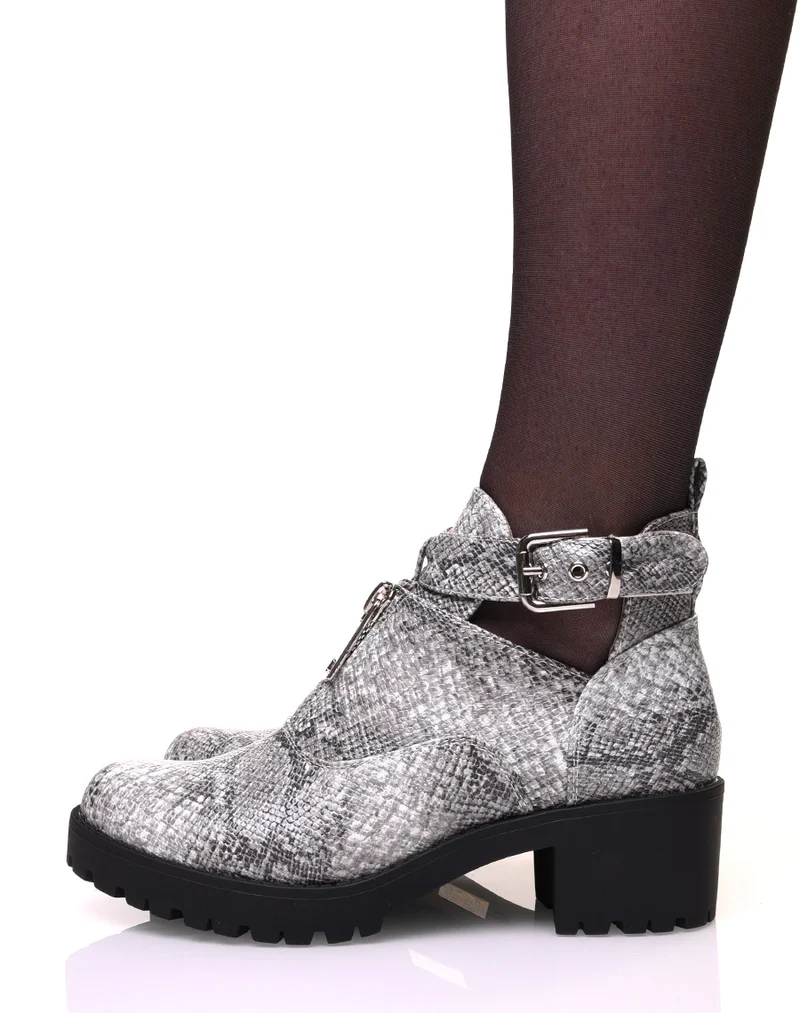 Bottines effet python ajourées à sangles et zippées