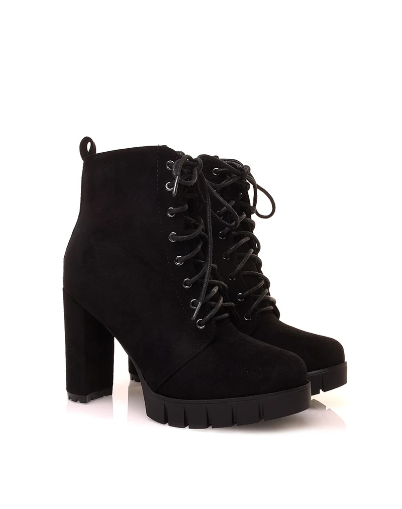 Bottines noires en suédine à talon et plateforme épaisse