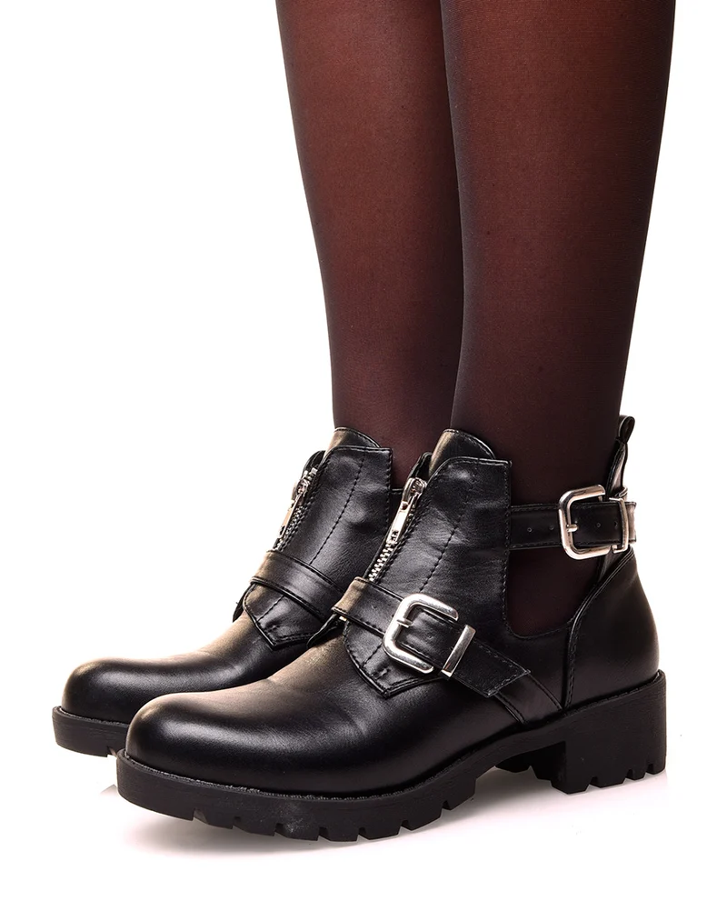 Bottines noires ajourées de sangles et d’un zip