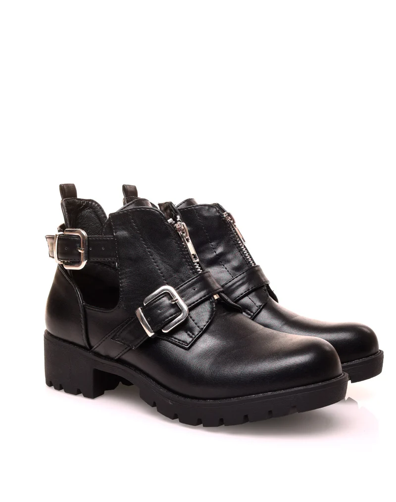 Bottines noires ajourées de sangles et d’un zip