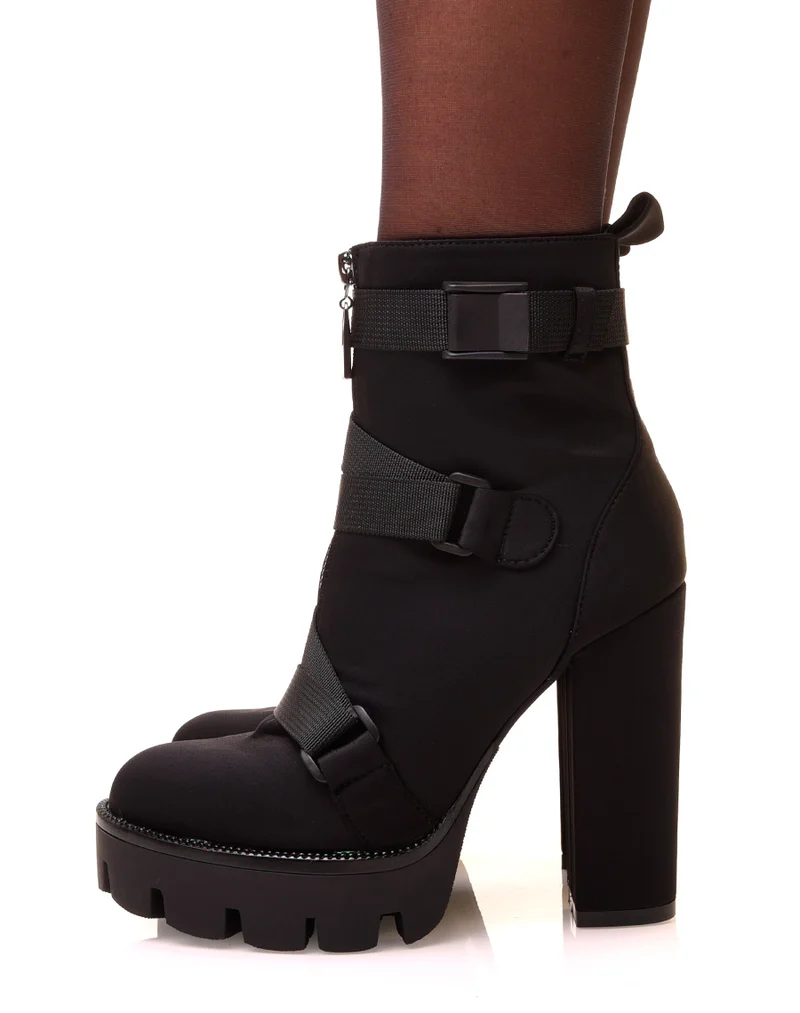 Bottines noires montantes à talons et à lanières multiples